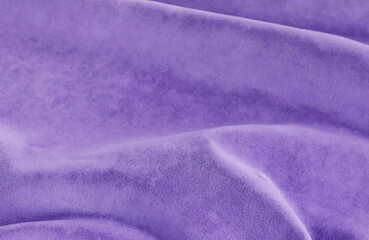 Fototapeta na wymiar velvet texture violet purple color background, expensive luxury fabric, material, wallpaper. copy space