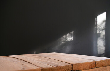 illuminated product table. Wall background with fire effect