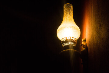 Vintage style lamp light on the wall at night