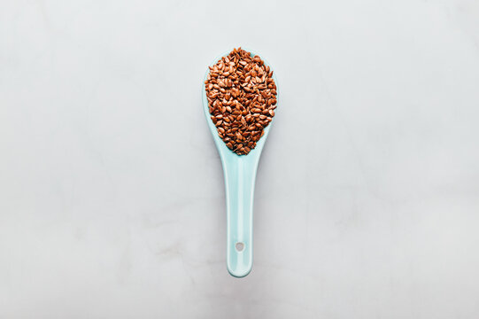 Brown Linseeds in spoon