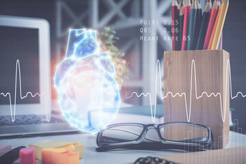 Heart drawing with glasses on the table background. Concept of medical education and healthcare....