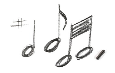 Graphite stick with musical notes hatching, sketching isolated on white background, top view