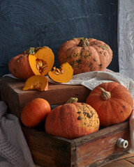Harvest pumpkin, pumpkin in a wooden box, a lot of pumpkin.