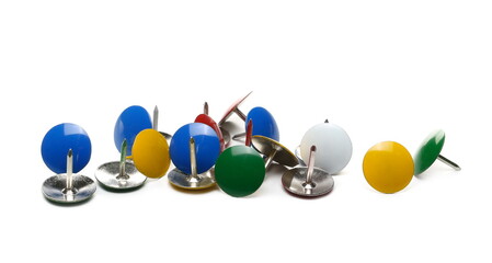 Colorful metal pushpins, thumb tacks isolated on white background