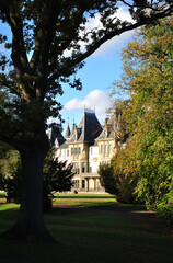 Facade of Traditional 19th Century Stone Building  in Sunny Public Park