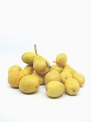 fresh yellow dates isolated on white background 