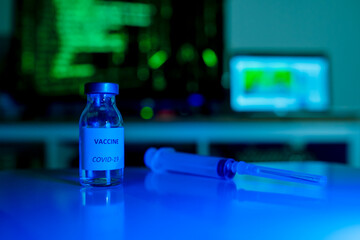 coronavirus covid-19 vaccine and syringe. vaccine for treatment.