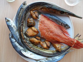 Seafood and fish on a plate.