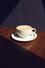 Cup of appuccino with beautiful foam and latte art