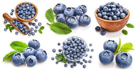 Collage mix set of ripe blue wildberry berries with green leaves in the wooden bowls. Isolated on white background.