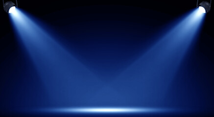 Spotlights illuminate empty stage