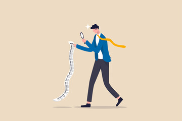Paying bills, cost and expense analysis for business or personal finance concept, smart businessman using magnifying glass to analyze budget, income tax or expense on long invoice receipt paper.