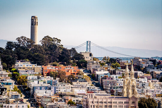 Nice view San Francisco skyline and Coit tower together with Oakland bay bridge during summer season in the afternoon from  the heart of San Francisco , California , United Staes of America