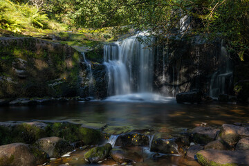 Fototapeta na wymiar Lower Blaen-y-Glyn waterfalls in the Brecon Beacons, Wales, UK