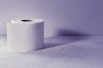 Toilet paper roll on table. Copy space for text.
