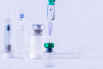 Pharmaceutical research. Syringe and vaccine. Research, Medicine, pharmacy And Health Care 