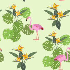 Seamless vector illustration with tropical leaves, flowers and pink flamingo.