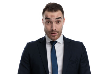 Speechless businessman looking forward while standing