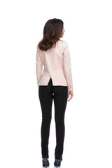 Back view of businesswoman looking away and standing