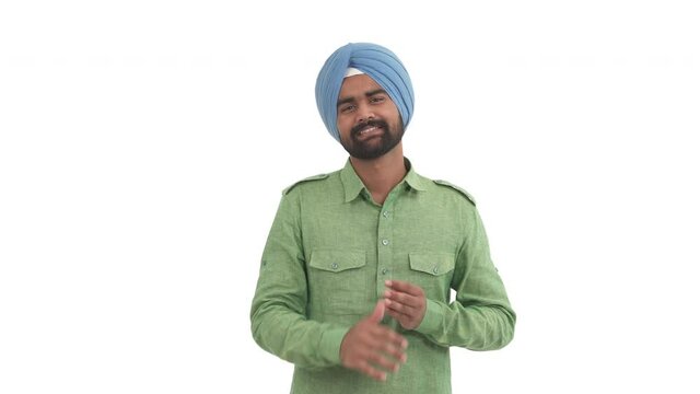 Beard Indian man rubbing hands expressing feeling of excited expectation. Body language concept. Isolated on white background