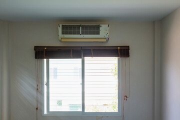 air conditional was remove plastic cover until cooling coil waiting repair or clean over window with sunlight
