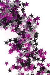 Fototapeta na wymiar purple stars confetti pattern isolated on white background top view, Festive, holiday, Christmas backdrop.