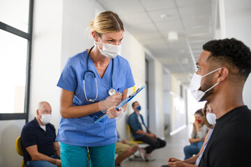 Portrait of nurse and man with face masks, coronavirus, covid-19 and vaccination concept.