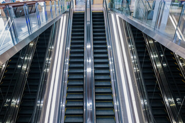 Modern luxury escalators with staircase at airport