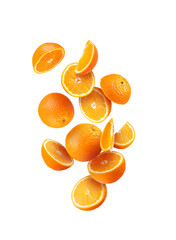Whole and sliced fresh orange in the air isolated on white
