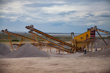 Karaganda, Kazakhstan. Rock crushing plant. Gravel separation machine. Construction materials production.