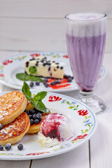 pancakes with ice cream and blueberries