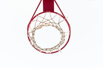 Basketball hoop with white sky in horizontal position. View taken from below.