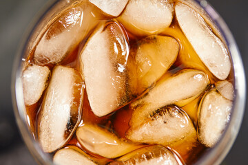  Ice cubes in cola beverage