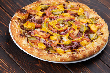 pizza on the wooden background
