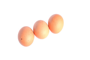Three chicken eggs isolated on white background