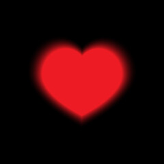 Red glowing heart on a black background