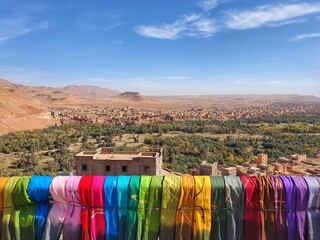 a pic of colorful scarves in a random place in Morocco