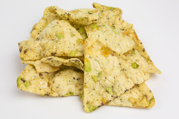 healthy snack of crisps with chickpea, green and yellow peas, black beans and herbs