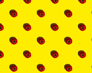 pattern red tomatoes on a yellow background