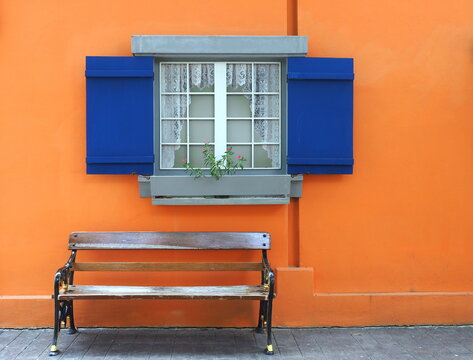 Blue shutters on orange walls