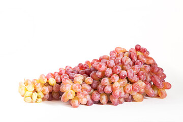 Branch of ripe delicious sweet red grapes isolated on white background