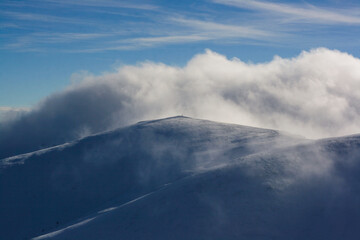 Fototapeta na wymiar epic clouds over the mountains