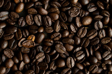 Fresh arabica coffee beans as a texture or background.