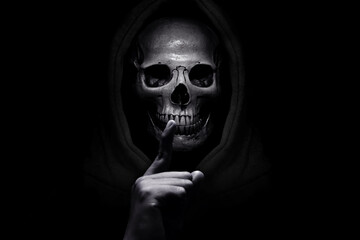 Grim reaper on dark background