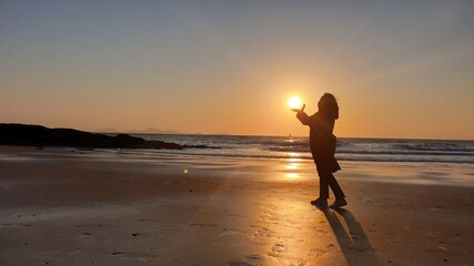 Fototapeta na wymiar the beach at sunset