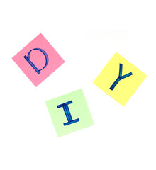 DIY do it yourself. Lettering in paper on white background.