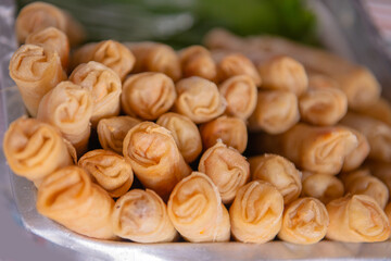 Pile of crispy spring roll in market