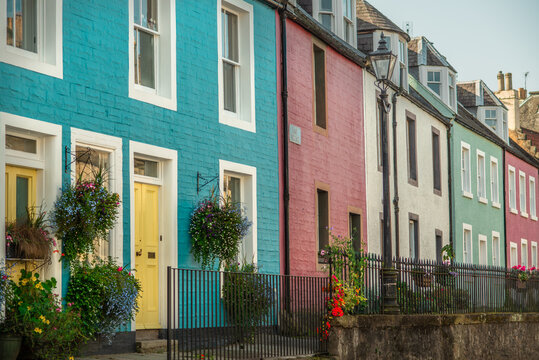 Colorful Terrace Houses and Hanging Baskets on a Street in South Queensferry, Scotland