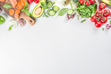 Organic fresh raw vegetables flatlay. Healthy food cooking background with various vegetable salad ingredients.  Vegetarian fresh raw food concept. Top view, copy space