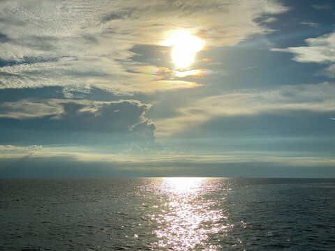 The afternoon sun that coming down to the horizon over the sea at Koh Tao, Thailand